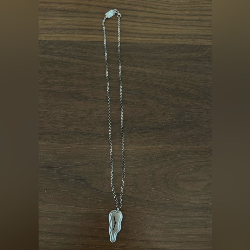 Salvador dali melting clock necklace